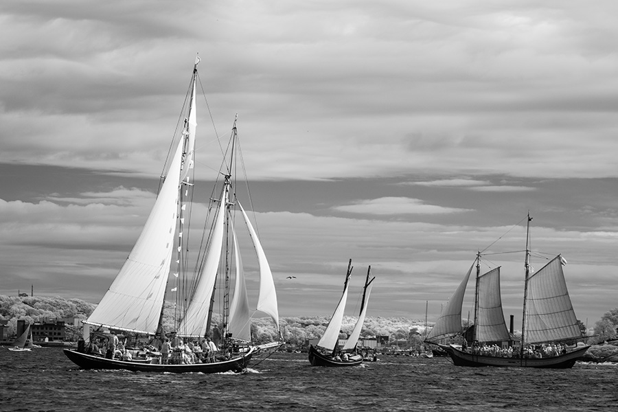 Infrared Photo of Three Large Sailboats Under Sail.
